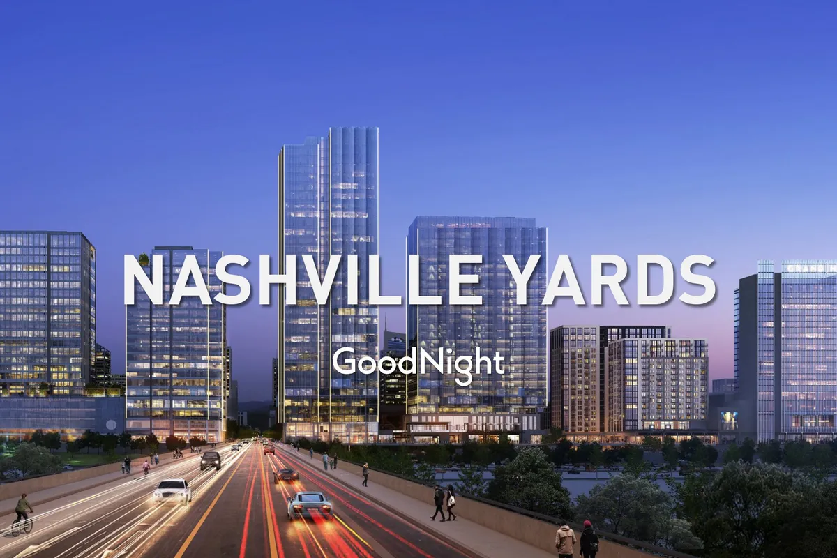 A panoramic cityscape showing modern skyscrapers, bustling city lights, and traffic—all bathed in the energy of evening. The vibrant downtown environment is depicted as dynamic and full of possibilities for work, networking, and entertainment.